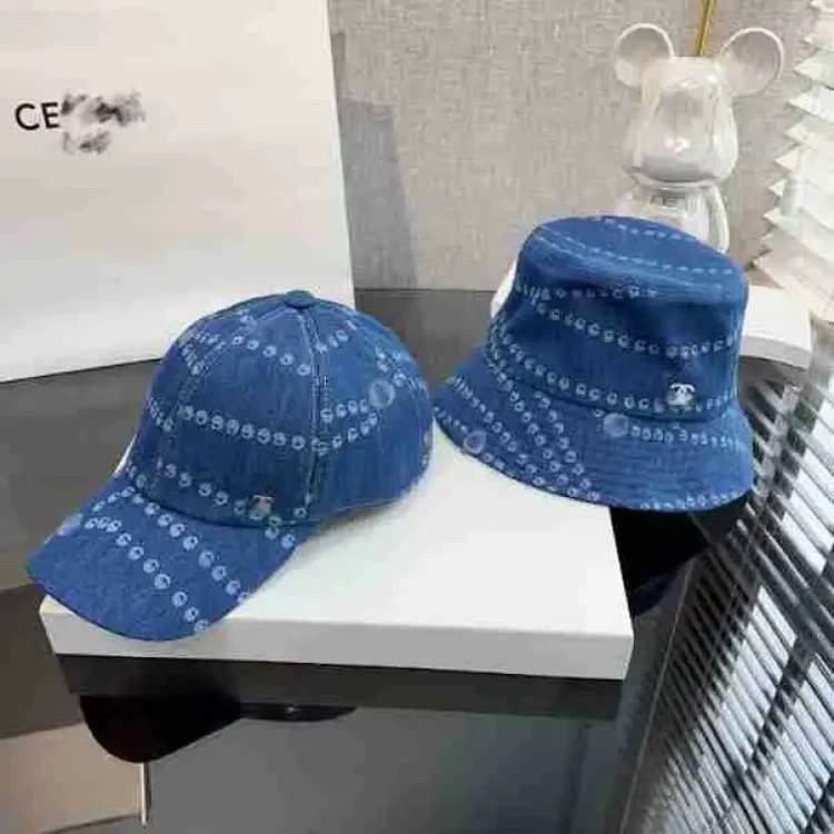 The details fill the market with the high-end 25 spring and style denim denim chain print fisherman hat baseball cap