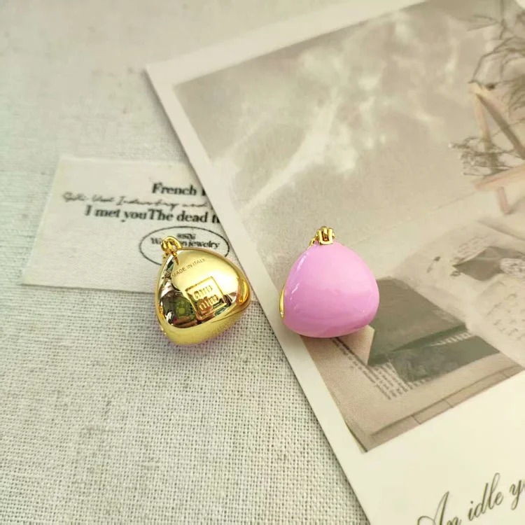 Ms. Miao's 26 multi-color hazelnut earrings, high-end candy-colored triangle earrings, sweet and cool enamel earrings
