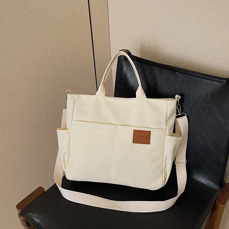 Japanese lightweight multi-layer portable shoulder bag waterproof casual commuting all-match tote bag solid color soft canvas bag for women