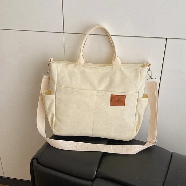 Japanese lightweight multi-layer portable shoulder bag waterproof casual commuting all-match tote bag solid color soft canvas bag for women