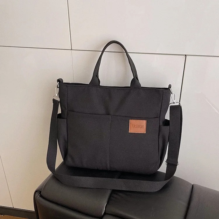 Japanese lightweight multi-layer portable shoulder bag waterproof casual commuting all-match tote bag solid color soft canvas bag for women