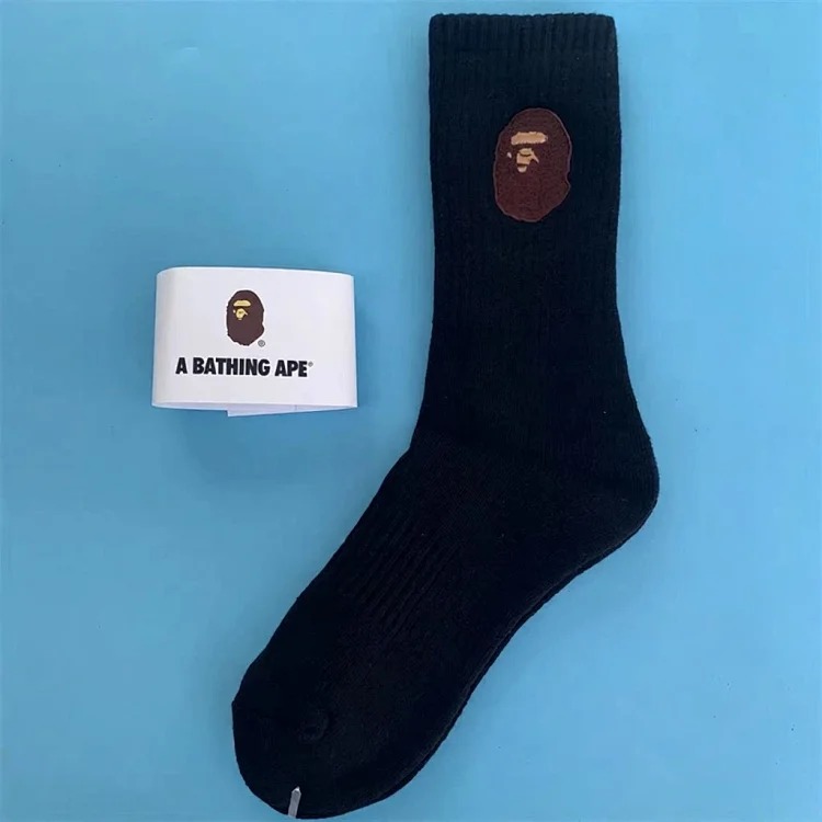 BAPE ape head socks for men and women with large embroidered logo, thickened towel bottom, black and white trendy sports socks image 3
