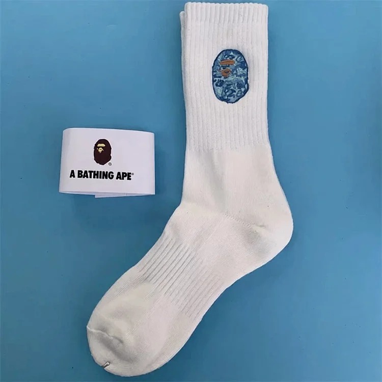 BAPE ape head socks for men and women with large embroidered logo, thickened towel bottom, black and white trendy sports socks image 4