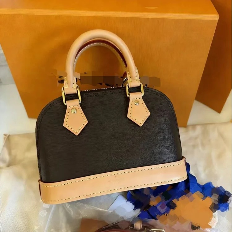 Louis Vuitton Mahu high-quality presbyopic shell bag vegetable-tanned genuine leather women's bag hand-held shoulder crossbody bag second-hand style 2026 new style