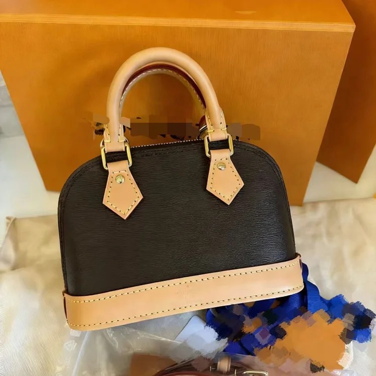 Louis Vuitton Mahu high-quality presbyopic shell bag vegetable-tanned genuine leather women's bag hand-held shoulder crossbody bag second-hand style 2026 new style image 4
