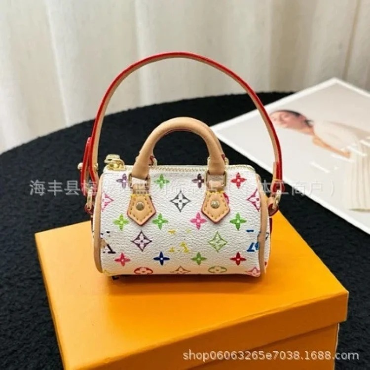Louis Vuitton Murakami Takahiro three-color mini pillow bag, light luxury and western style old flower bag pendant, handmade denim fabric pendant