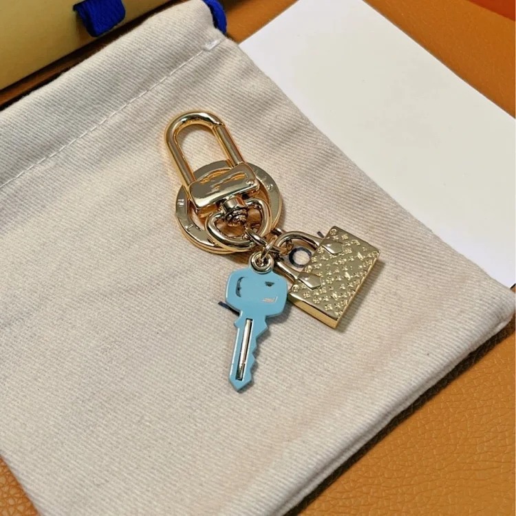 Cross-border jewelry bag hanging wholesale keychain pendant bag chain trendy brand titanium steel keychain