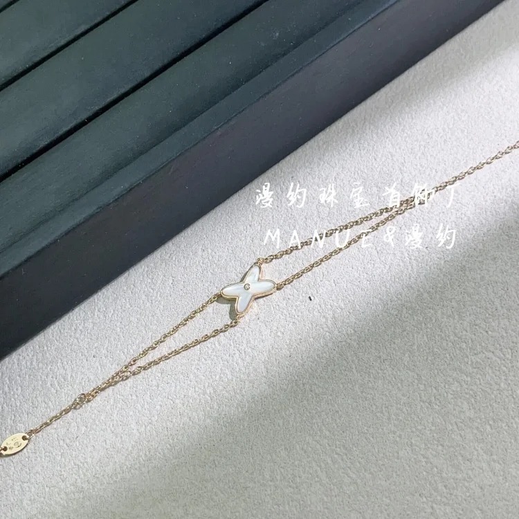 Natural mother-of-pearl cross double layer bracelet for women, thick 18K gold plated temperament hand jewelry, factory direct sales and wholesale