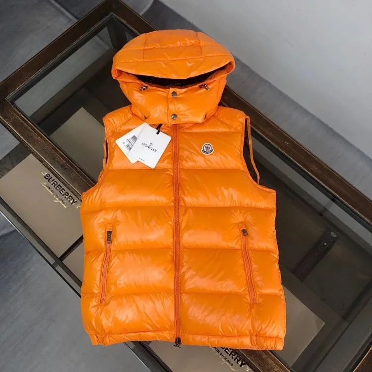 Good quality moncle couple's hooded down vest.