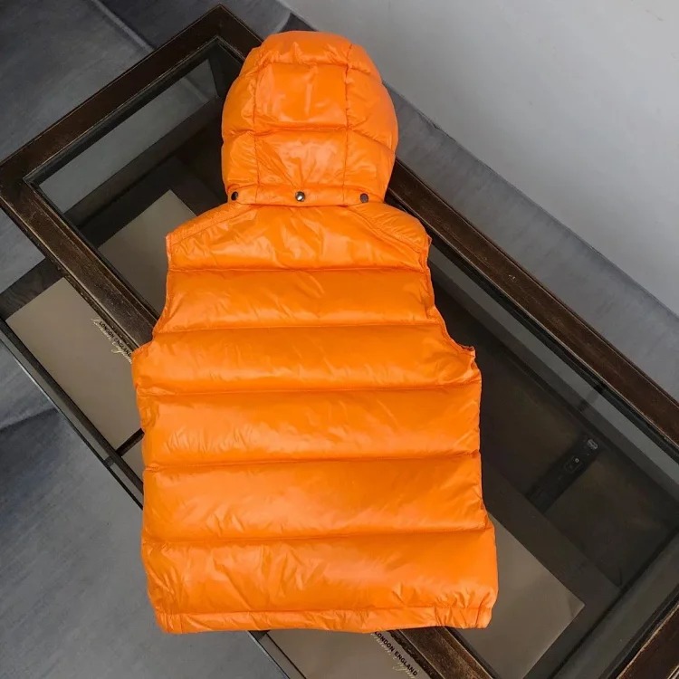 Good quality moncle couple's hooded down vest.