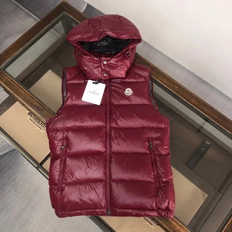 Good quality moncle couple's hooded down vest.