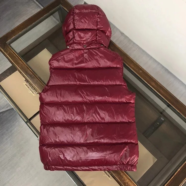Good quality moncle couple's hooded down vest.