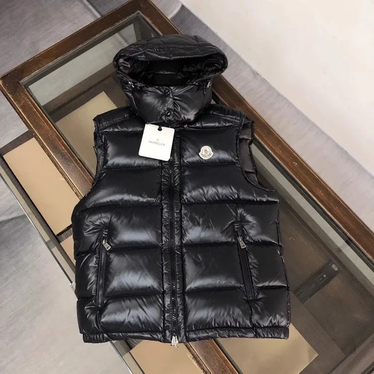Good quality moncle couple's hooded down vest.