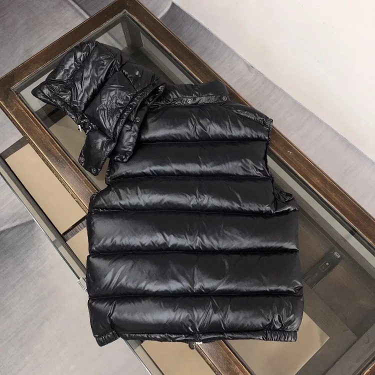 Good quality moncle couple's hooded down vest.