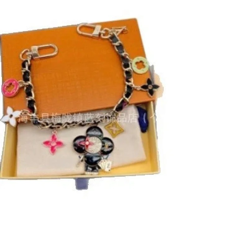Louis Vuitton Colorful sunflower keychain bag pendant old flower element decorative chain creative pendant