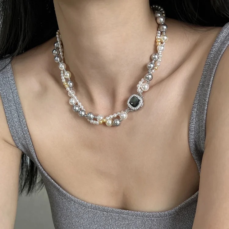 A two-stacked double-layered pearl necklace for women, light luxury and high-end mixed-color niche versatile autumn and winter sweater chain decoration