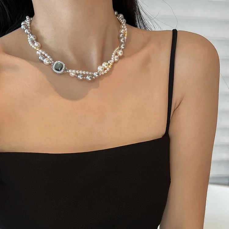 A two-stacked double-layered pearl necklace for women, light luxury and high-end mixed-color niche versatile autumn and winter sweater chain decoration