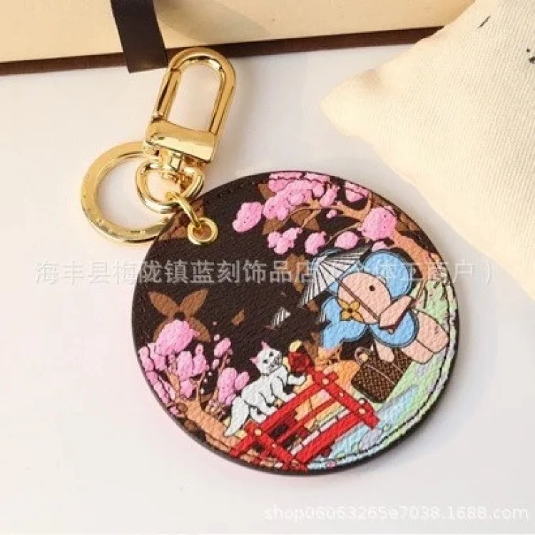 Round brand sunflower keychain trendy brand letter pendant foreign trade supply bag pendant jewelry pendant