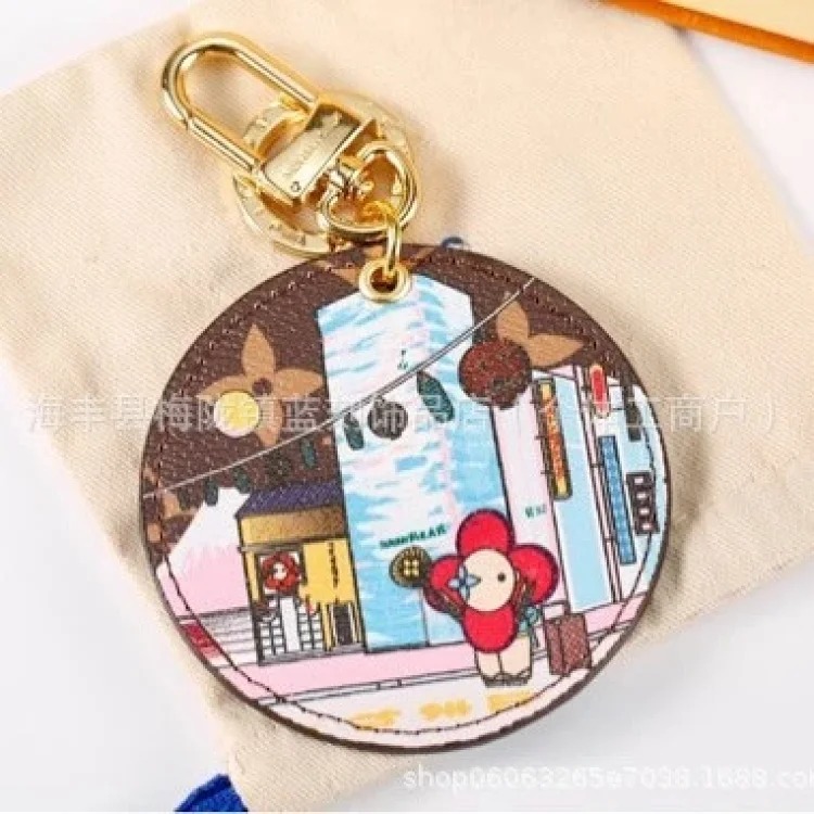 Round brand sunflower keychain trendy brand letter pendant foreign trade supply bag pendant jewelry pendant