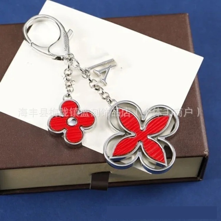 New creative metal flower keychain fashion tassel bag key chain pendant