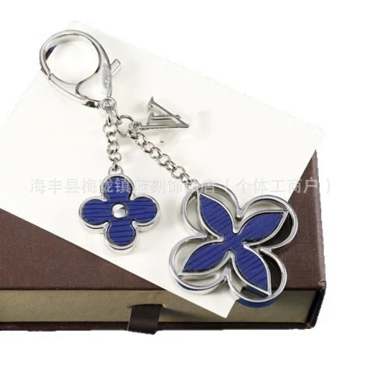 New creative metal flower keychain fashion tassel bag key chain pendant