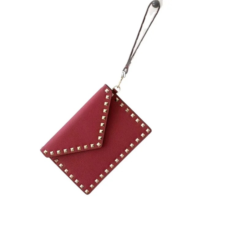 Rivet clutch bag 2026 new cowhide storage bag envelope bag small square bag fashionable simple versatile women's bag