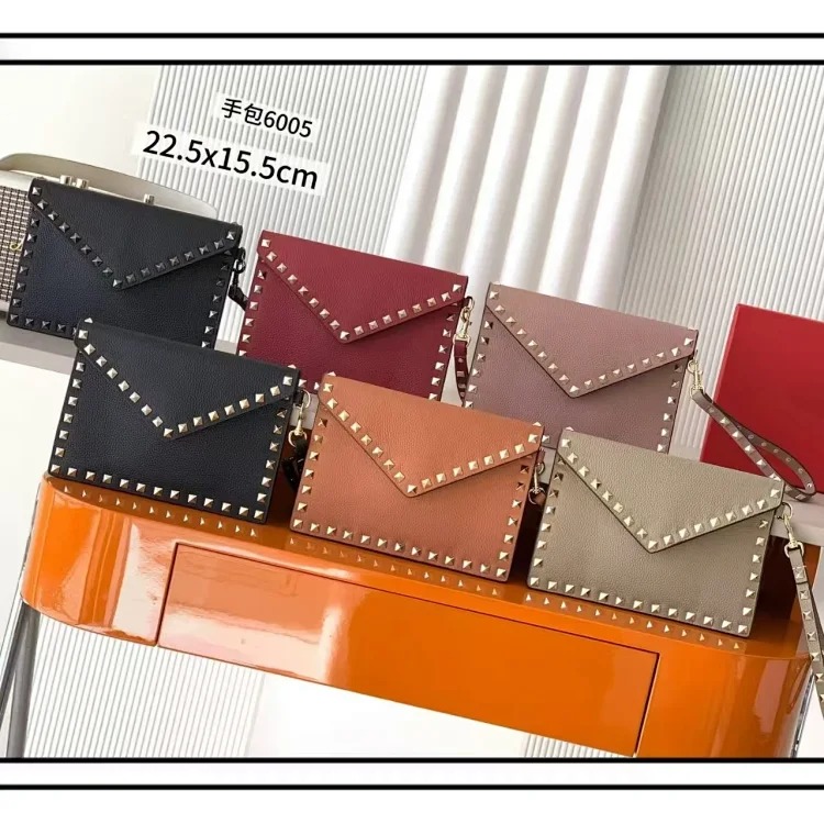 Rivet clutch bag 2026 new cowhide storage bag envelope bag small square bag fashionable simple versatile women's bag