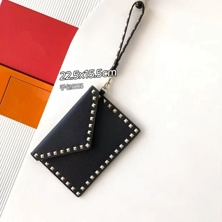 Rivet clutch bag 2026 new cowhide storage bag envelope bag small square bag fashionable simple versatile women's bag
