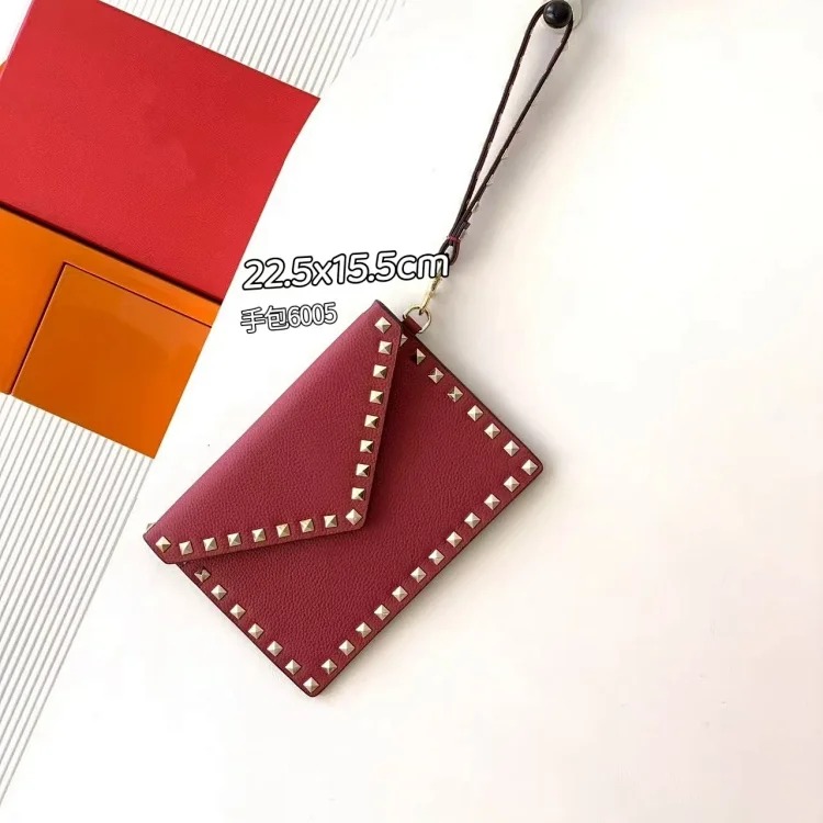 Rivet clutch bag 2026 new cowhide storage bag envelope bag small square bag fashionable simple versatile women's bag