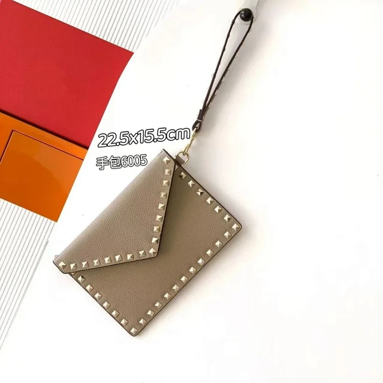 Rivet clutch bag 2026 new cowhide storage bag envelope bag small square bag fashionable simple versatile women's bag