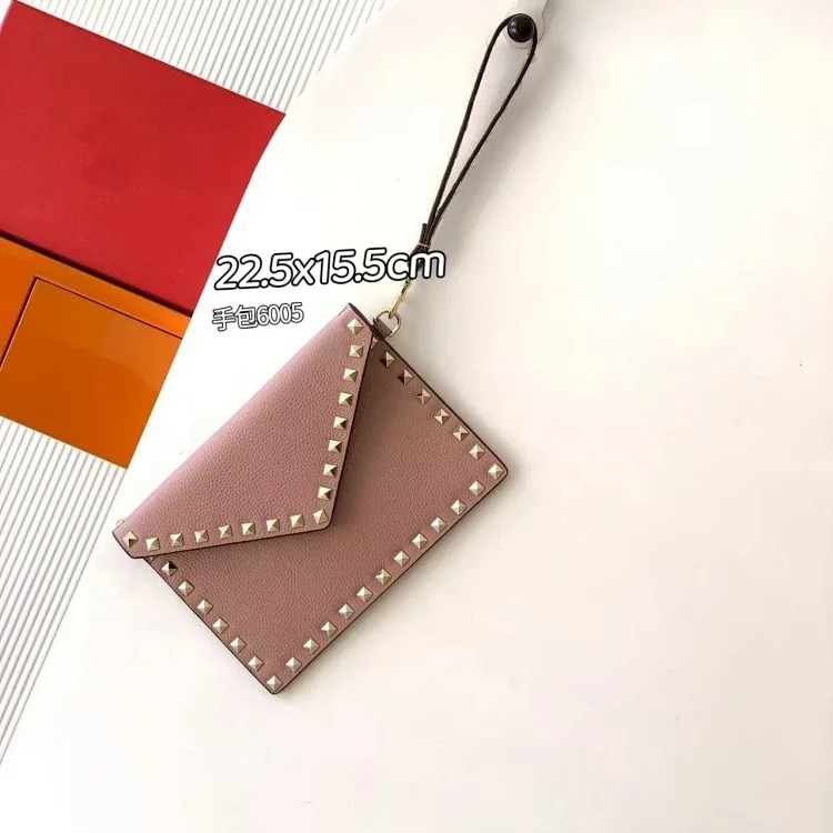 Rivet clutch bag 2026 new cowhide storage bag envelope bag small square bag fashionable simple versatile women's bag