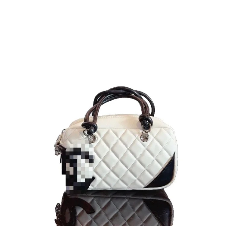 Wholesale black and white panda bowling ball vintage Kangpeng second hand rhombus pillow bag shoulder handbag