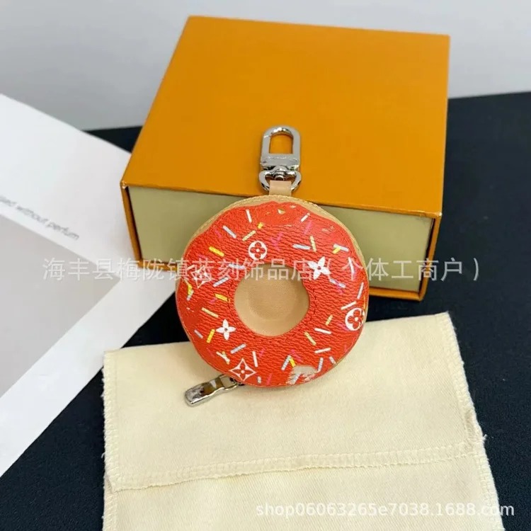 Louis Vuitton New donut bag pendant light luxury niche genuine leather pendant snack simulation splicing old flower bag pendant