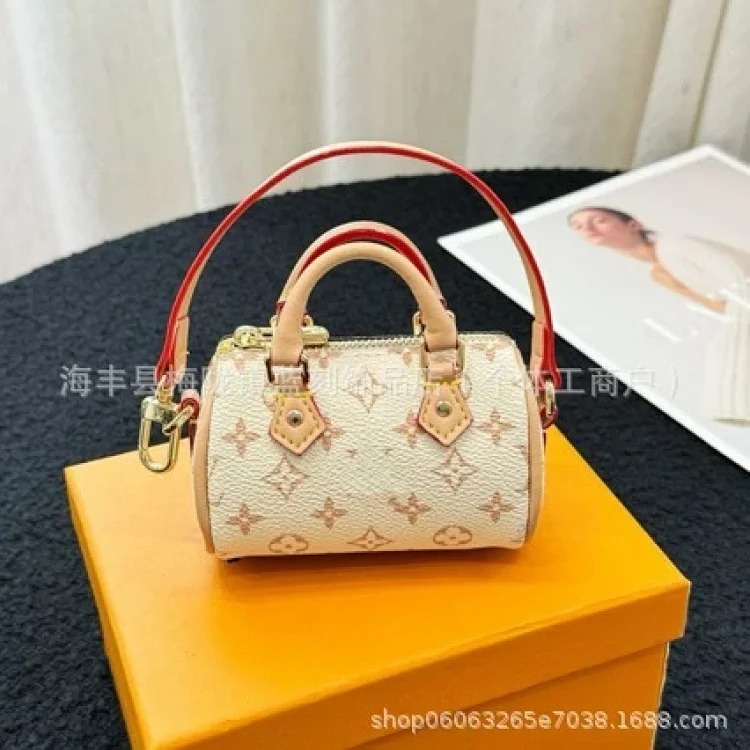 Louis Vuitton Murakami Takahiro three-color mini pillow bag, light luxury and western style old flower bag pendant, handmade denim fabric pendant
