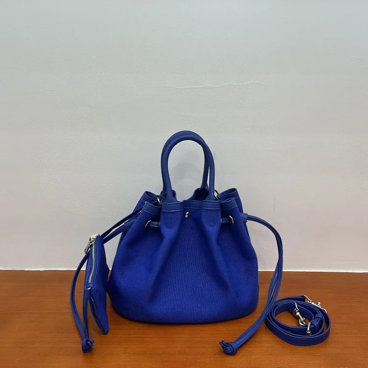 Canvas and cowhide popular vegetable basket bag tote bag niche casual drawstring canvas crossbody bag small outing bag