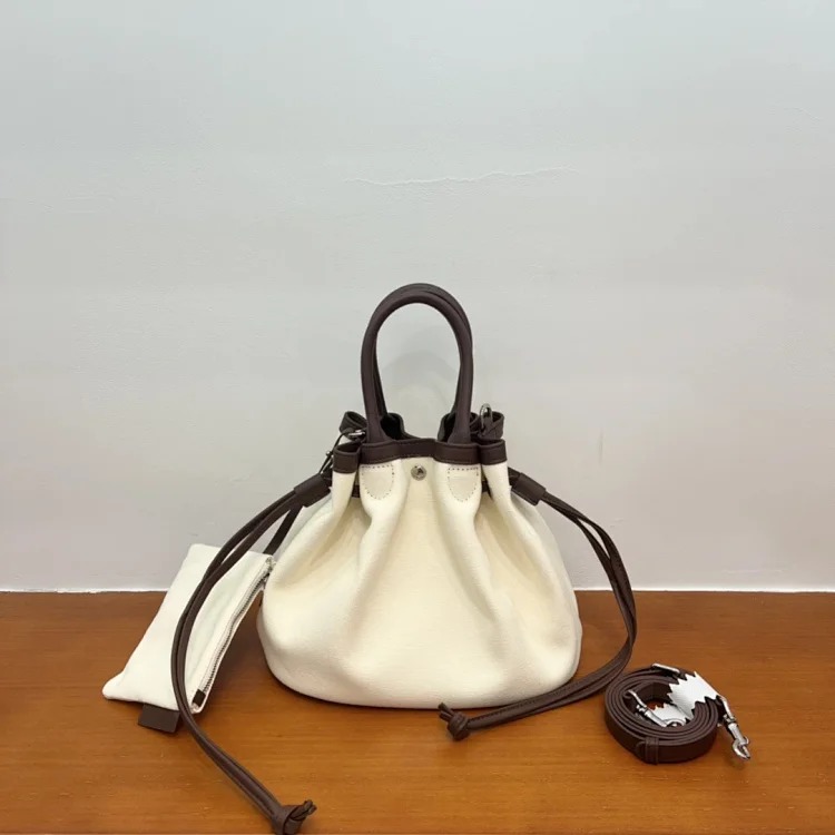 Canvas and cowhide popular vegetable basket bag tote bag niche casual drawstring canvas crossbody bag small outing bag