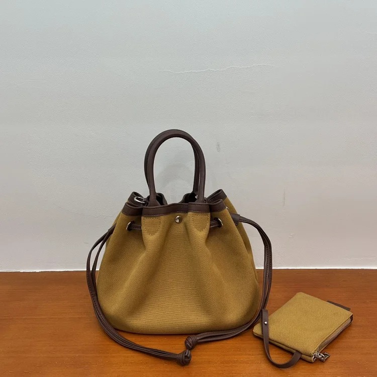 Canvas and cowhide popular vegetable basket bag tote bag niche casual drawstring canvas crossbody bag small outing bag