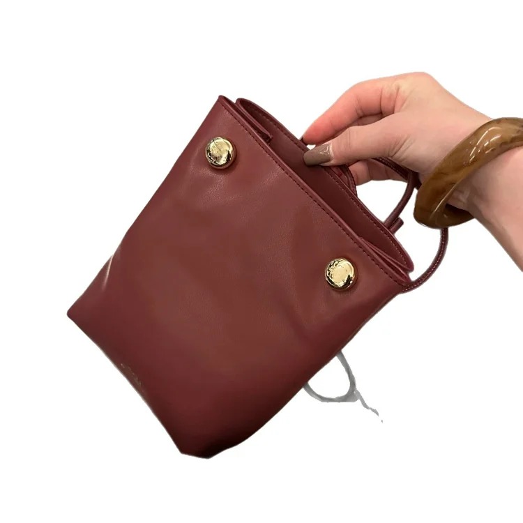 Pebble mobile phone bag 2025 new leather bucket fashion simple and exquisite one-shoulder cross-body small bag fashionable