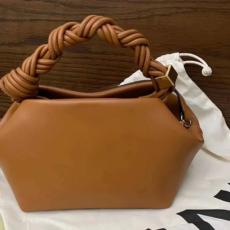 Amazon's best-selling pleated handle women's clutch versatile commuting large capacity soft glutinous dumpling bag Shiling bag